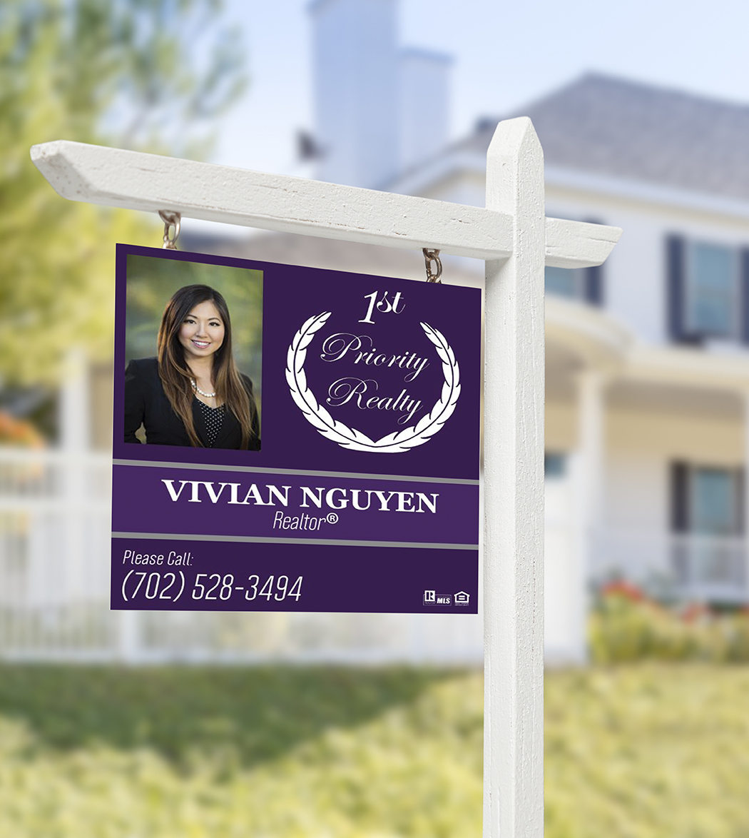 Home For Sale Real Estate Sign in Front of Beautiful New House.